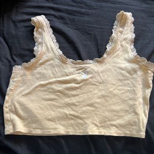 Yellow Playboy crop top. Size Large.